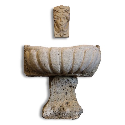 Ancient travertine fountain. 